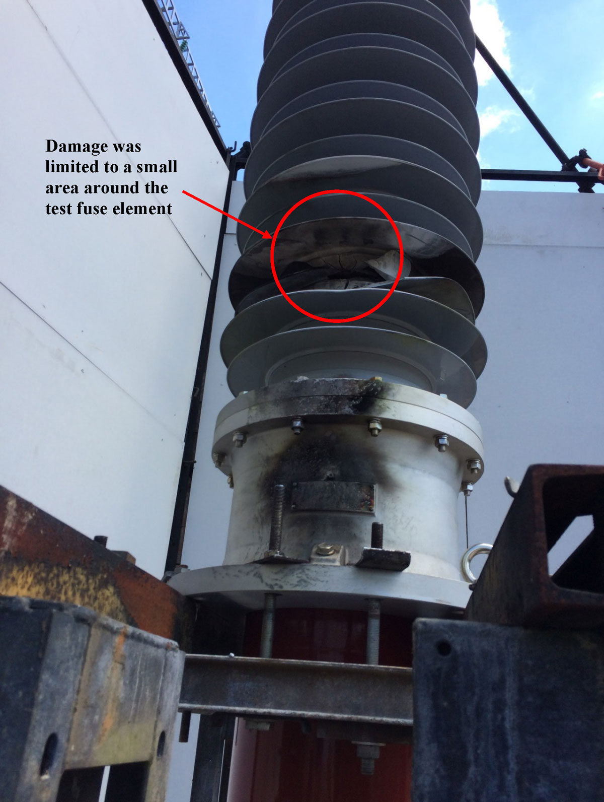 RIF Bushing internal arc fault test damage showing damage limited to test fuse element
